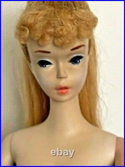 Blond Ponytail # 3 number 3 Barbie no touch ups. Blue eye liner. Long hair