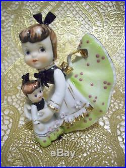 RARE VTG Japan Christmas Blue Angel Girl w Santa Doll on Back Figurine