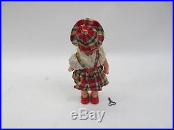 VINTAGE TIN / CELLULOID WIND UP WALKING DOLL with KEY MADE IN JAPAN 14 TALL