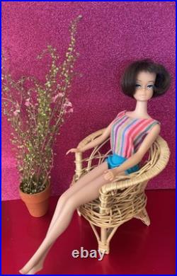 Vintage American Girl Barbie doll withoriginal swimsuit and Barbie outfit