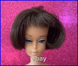 Vintage American Girl Barbie doll withoriginal swimsuit and Barbie outfit