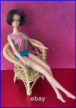 Vintage American Girl Barbie doll withoriginal swimsuit and Barbie outfit