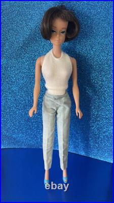 Vintage American Girl Barbie doll withoriginal swimsuit and Barbie outfit