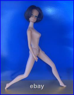 Vintage American Girl Barbie doll withoriginal swimsuit and Barbie outfit