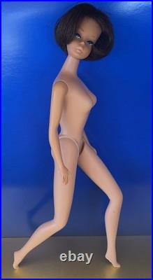 Vintage American Girl Barbie doll withoriginal swimsuit and Barbie outfit