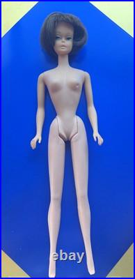 Vintage American Girl Barbie doll withoriginal swimsuit and Barbie outfit