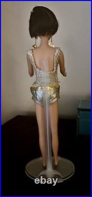 Vintage Barbie 1967 Casey MOD Doll #1180 Brunette Withswimsuit and earrings