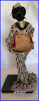 Vintage Japanese Geisha Doll in Kimono on Wood Pedestal Beautiful Vintage Japanese Geisha Doll in Kimono on Wood Pedestal Beautiful