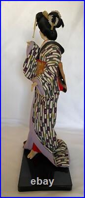 Vintage Japanese Geisha Doll in Kimono on Wood Pedestal Beautiful Vintage Japanese Geisha Doll in Kimono on Wood Pedestal Beautiful
