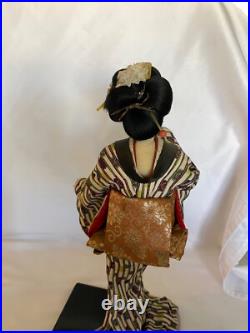 Vintage Japanese Geisha Doll in Kimono on Wood Pedestal Beautiful Vintage Japanese Geisha Doll in Kimono on Wood Pedestal Beautiful