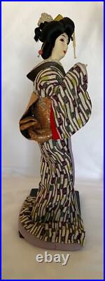 Vintage Japanese Geisha Doll in Kimono on Wood Pedestal Beautiful Vintage Japanese Geisha Doll in Kimono on Wood Pedestal Beautiful