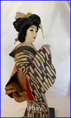 Vintage Japanese Geisha Doll in Kimono on Wood Pedestal Beautiful Vintage Japanese Geisha Doll in Kimono on Wood Pedestal Beautiful