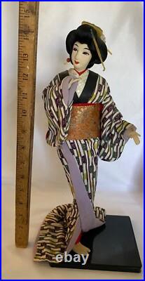 Vintage Japanese Geisha Doll in Kimono on Wood Pedestal Beautiful Vintage Japanese Geisha Doll in Kimono on Wood Pedestal Beautiful