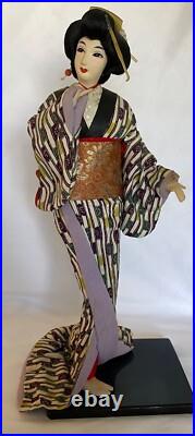 Vintage Japanese Geisha Doll in Kimono on Wood Pedestal Beautiful Vintage Japanese Geisha Doll in Kimono on Wood Pedestal Beautiful