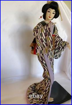 Vintage Japanese Geisha Doll in Kimono on Wood Pedestal Beautiful Vintage Japanese Geisha Doll in Kimono on Wood Pedestal Beautiful