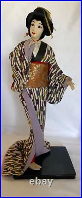 Vintage Japanese Geisha Doll in Kimono on Wood Pedestal Beautiful Vintage Japanese Geisha Doll in Kimono on Wood Pedestal Beautiful