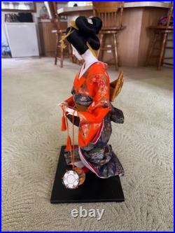 Vintage Japanese Geisha Doll in Multi Color Red Floral Kimono 13 Wood Base