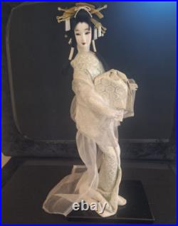 Vintage Nishii Japanese Geisha doll 24 tall on black lacquer wooden base