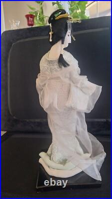 Vintage Nishii Japanese Geisha doll 24 tall on black lacquer wooden base